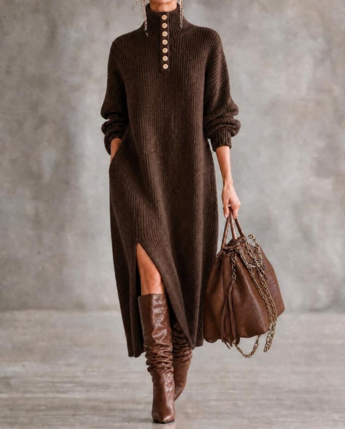 Person wearing a long brown ribbed sweater dress and tall brown leather boots.